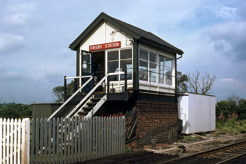 Frisby Station signal box (LMS, 1941) 
 Frisby signal box is located at a level crossing on the edge of the village of Frisby on the Wreake. At the time of writing it is still in use today as a crossing box and whilst essentially similar still maintaining its LMS origin nameboard it has had the Network Rail 'treatment'. The box is an LMS Type 11C dating from 1941. It replaced an earlier structure that simply controlled the crossing. 
 Keywords: Frisby Station Signal Box