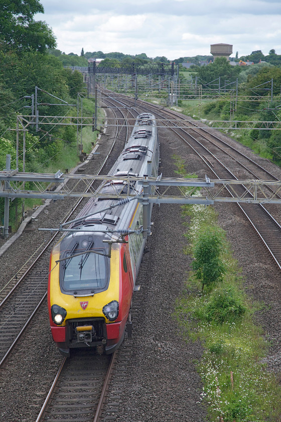 Class 221, VT 12.35 Chester-London Euston (1A33, RT), Victoria Bridge 
 Yet another unidentified class 221 passes Victoria Bridge in Northamptonshire forming the 12.35 Chester to London Euston service. Quite why the set number is hidden so low down rendering it impossible to read from the lineside, frustrates me at times! At least the 390s can be identified from the little number on their carriage roofs near the pantographs. 
 Keywords: Class 221 1A33 Victoria Bridge