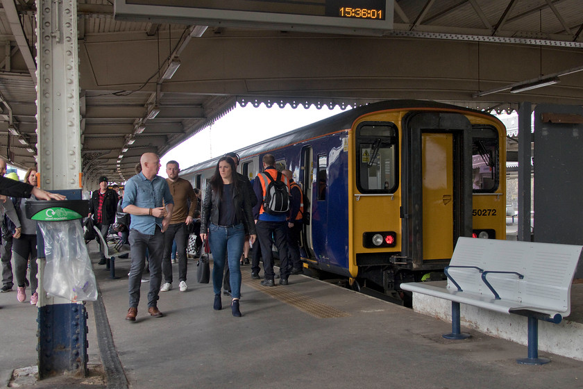 150272, NT 14.38 Leeds-Lincoln (1L65, 11L), Sheffield station 
 A busy scene at Sheffield as passengers disembark from 150272 that has just arrived. It is working the curiously routed 14.38 Leeds to Lincoln. Here at Sheffield, the train will reverse to continue its journey eastwards after a crew change, who can be seen in discussions by the cab door. 
 Keywords: 150272 14.38 Leeds-Lincoln 1L65 Sheffield station