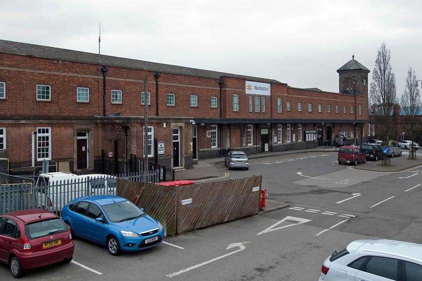 Frontage, Nuneaton station 
 In the rankings of station architecture I doubt if Nuneaton would win any prizes? However, like all railway structures it has its place in history. There has been a station on this site since the LNWR opened the first one in 1847. However, by the start of the twentieth century this had proved to be inadequate so was rebuilt for the second time in 1915. This building was designed by the notable architect Reginald Wynn Owen who did a lot of work for the LNWR; he was obviously having an off day when it came to Nuneaton! 
 Keywords: Nuneaton station frontage