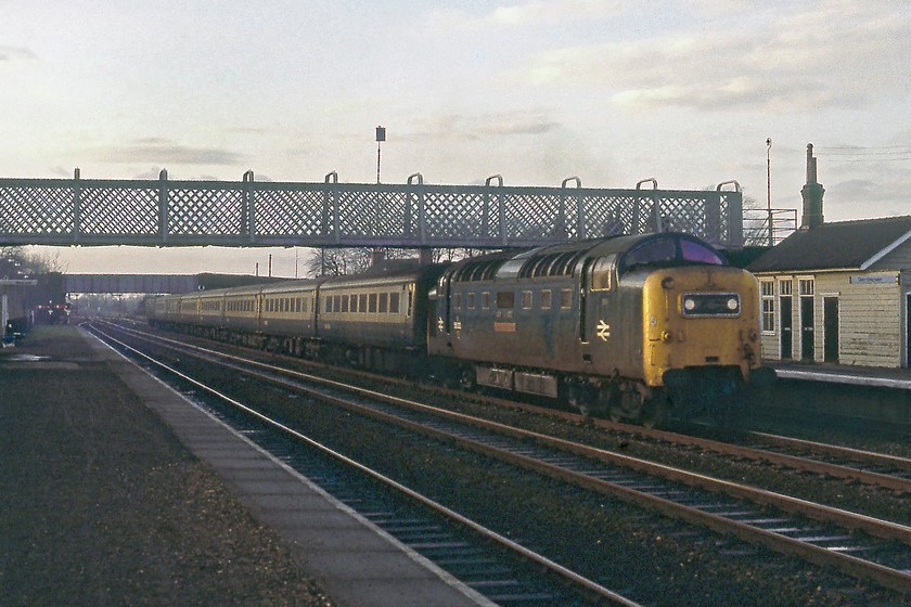 55022, 12.05 Kings Cross-Hull (1D02), Gilberdyke station 
 The Napier soundtrack to this photograph was pretty dramatic! 55022 'Royal Scots Grey' could be heard for some distance as it approached Gilberdyke in the afternoon slowing for the junction just beyond the bridge in the background. The driver then flew open the power handle and it roared through the station heading on towards Hull with the 1D02 12.05 ex Kings' Cross. Royal Scots Grey was always recognisable by the strange and somewhat rusty dent on its nose.

There is an audio recording of this event on my Youtube channel, see.. https://youtu.be/HaXxiofriXY 
 Keywords: 55022 12.05 Kings Cross-Hull 1D02 Gilberdyke station Royal Scots Grey