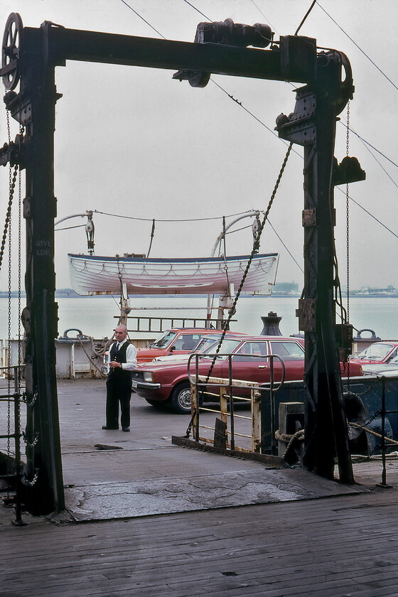 Loading ramp, MV Farringford, New Holland Pier 
 The MV Farringford loading ramp is secured as boarding is underway for the 13.15 sailing from New Holland to Hull Corporation Pier. Already loaded, amongst others is a Mk. IV Cortina and an Auston Maxi. One of Farringford's two main lifeboats is seen in the background. Notice the smartly dressed member of the crew awaiting the next vehicle to be loaded for the crossing to Hull. 
 Keywords: Loading ramp MV Farringford New Holland Pier