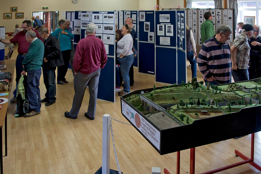 Exhibition and scale model of Roade Cutting, Roade Village Hall 
 A general view of the exhibition on Roade Village Hall commemorating the 180th anniversary of the opening of Roade Cutting in 1838. It was full of fascinating information about the history of the railway in Roade. Even a local enthusiast like me learnt some things, for example, I did not know the names of the two footbridges that I use to photograph trains from. 
 Keywords: Exhibition scale model Roade Cutting Roade Village Hall