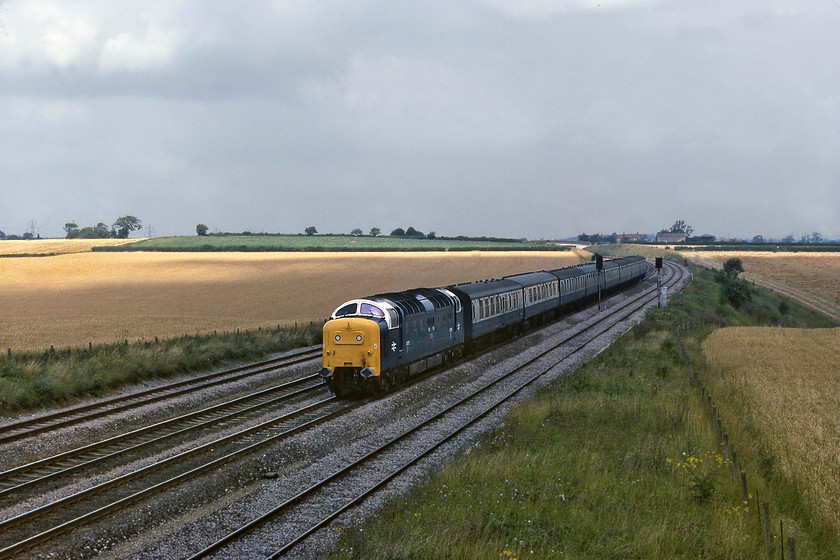 55015, 09.35 Hull-London King`s Cross (1A13), Swayfield SK994231 
 Looking very smart with its trademark Finsbury Park white cab surrounds, 55015 'Tulyar' descends Stoke Bank with the 09.35 Hull to King's Cross composed of a rake of Mk. I stock. It's such a shame that the patch of sunshine on the wheat field in the background did not make it across to the track in time to illuminate the train! In 2019, on the launch day of the Azumas, I stood at this spot and took a nearly identical shot, but the subject matter was not quite so exciting, see.... https://www.ontheupfast.com/v/photos/21936chg/26500883404/x158012-em-06-47-liverpool-lime-street 
 Keywords: 55015 09.35 Hull-London King`s Cross 1A13 Swayfield SK99423