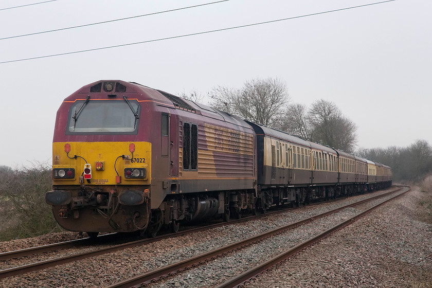 67022, outward leg of The Midland Meander (London Euston-Stratford-on-Avon (1Z67), Lidlington SP982387 
 67022 brings up the rear of The Midland Meander railtour that started out at London Euston and was heading to Stratford-on-Avon. It is seen dropping down the grade towards Lidlington on the Marston Vale line approximately half way between Bletchley and Bedford. The picture is taken from a public foot crossing. 
 Keywords: 67022,_outward_leg_of_The_Midland_Meander_(London_Euston-Stratford-on-Avon_(1Z67)_Lidlington_SP982387