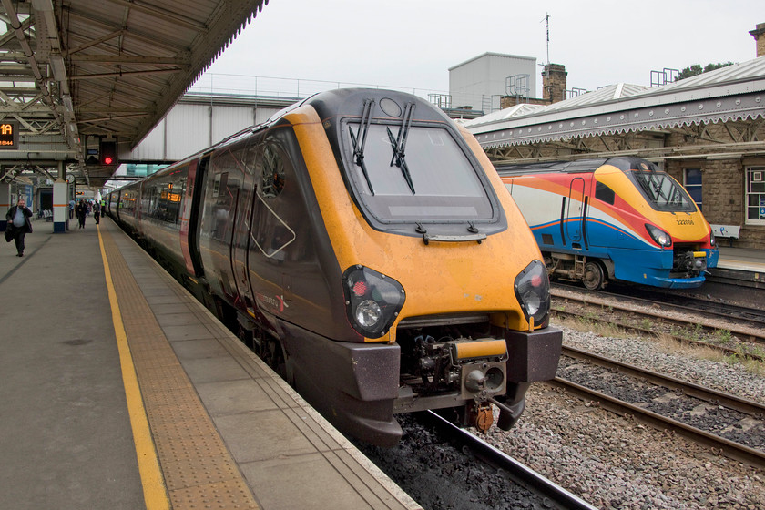 220029, XC 07.27 Plymouth-Newcastle (1S41, RT) & 222006, EM 12.29 Sheffield-London St. Pancras (1C45, RT), Sheffield station 
 Two units that are virtually identical in their construction but operating under different names, different classes and for different operators stand at Sheffield station. To the left at platform one is one of CrossCountry's Voyagers 220029 working the 07.27 Plymouth to Newcastle whilst EMR's Meridian 222029 waits to work the 12.29 to London St. Pancras. In theory, these two variants of the Bombardier built units ought to be able to operate together but they have incompatible electrical connections witnessed by the large jumper cable connector on the front of the 220 and its absence from the 222 being replaced by a chin cross piece. We took the CrossCountry service the relatively short distance to Wakefield in order to complete our journey. 
 Keywords: 220029 07.27 Plymouth-Newcastle 1S41 222006 12.29 Sheffield-London St. Pancras 1C41 Sheffield station Cross Country EMR Weast Midlands Railway