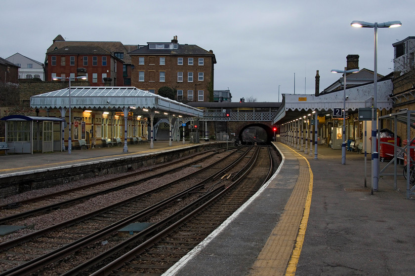 Maidstone West station 
 A very quiet Maidstone West station in the dusk of a February evening. The station was opened as the terminus of a branch from Paddock Wood in 1844. Twelve years later, the line was extended to the north Kent line at Strood. The station is looking quiet on this Sunday evening due to engineering works closing the line, hence the array of red signals on view. 
 Keywords: Maidstone West station