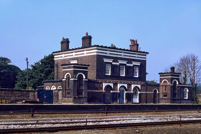 Holywell station (Closed) 
 Reminiscent of an elegant Italianate villa rather than a railway station Holywell stands proud on the former down platform. Opened in 1848 and designed by the renowned architect Francis Thompson the station was once a busy place and named Holywell Junction with a short branch to Holywell Town heading south from here. It closed in 1966 falling into a state of disrepair and dereliction finally being restored and returning to use a private residence in the early 2000s. There are active moves to reopen the station supported by the Welsh Government with it more likely to be named Greenfield rather than retaining its Holywell identity. 
 Keywords: Holywell station Closed