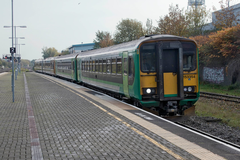 153354, class 153 & 170507, LN 11.09 Dorridge-Kidderminster (2K20, 6L), Small Heath station 
 A cobbled-together train forming the 11.09 Dorridge to Kidderminster cross-Birmingham working passes through Small Heath station. The train is made up of two London Midland liveried class 153 single car units, with 153354 leading. Attached to the rear is two-car 170507 in its West Midlands Railway livery. In this view, the somewhat desolate nature of Small Heath station can be seen. 
 Keywords: 153354 170507 11.09 Dorridge-Kidderminster 2K20 Small Heath station