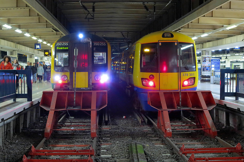 350255, LN 23.04 London Euston-Northampton (2N33, RT) & 378201, LO 22.57 London Euston-Watford Juncrion (2D47, 4L), London Euston station 
 A late night scene at Euston station. To the right is London Overground 378201 about to leave with the 22.57 to Watford Junction. To the left is our train back to Milton Keynes, the 23.04 2N33 stopper to Northampton. This service was surprisingly busy but did take an earth to get to our destination as it stopped at virtually every station on its journey north. 
 Keywords: 350255 2N33 378201 2D47 London Euston station