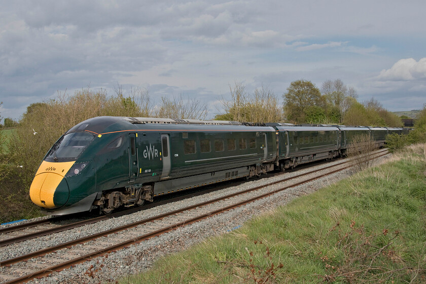 802109, GW 15.14 Plymouth-London Paddington (1A19, 15L), Fairwood ST851510 
 The rear of the 15.14 Plymouth to Paddington 1A19 service takes the Westbury cut off avoiding the town's station worked by GWR IET 802109. It is seen near the village of Fairwood that gives its name to the nearby junction. In common with all other GWR services worked by the IETs on this Friday afternoon, it was running at a reduced speed with it arriving at Paddington fifteen minutes late. 
 Keywords: 802109 15.14 Plymouth-London Paddington 1A19 Fairwood ST851510 Great Western IET GWR