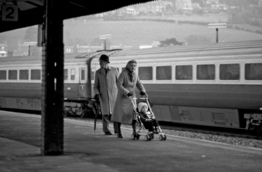 Grandparents on platform 2, 41038 TF, Bath Spa station 
 What I assume to be the grandparents push their grandaughter along platform two of Bath Spa station whilst a down HST waits at platform one. The coach behind them is 41038 (Trailer Fist) that was marshalled to the rear of down trains thus being at the city end on arrival backPaddington. I cannot help but feel that grandma bears an uncanny resemblance to PM Thatcher with even grandad doing a reasonable impression of Denis! 
 Keywords: Grandparents on platform 2 41038 TF Bath Spa station HST