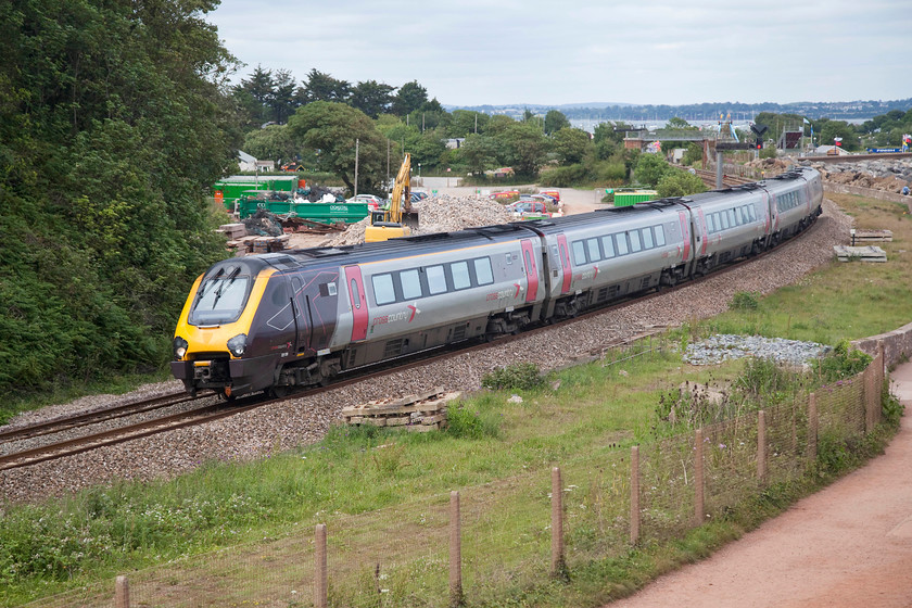 221138, XC 07.50 Glasgow Central-Plymouth (1V56, 3L), Langstone Rock 
 Cross Country 221138 passes Langstone Rock just south of Dawlish Warren forming the 07.50 Glasgow Central to Plymouth. I could image many better ways to make this journey rather than in a Voyager! 
 Keywords: 221138 1V56 Langstone Rock