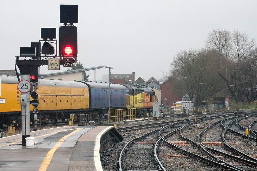 37099, stabled NR test train, Bristol Temple Meads station 
 On arrival at Bristol Temple Meads, Colas 37099 'Merl Evans 1947-2016' was stabled with it Network Rail test train to the north of the station. Despite some searching of the national timetable, I was unable to identify when this left temple Meads and where it was heading. 37099 was named after the model maker Bachmanns former Head of Research and Development who died in the summer of 2016. The naming ceremony took place at Derby station in December 2016 attended by members if Merl Evans' family. 
 Keywords: 37099 stabled NR test train Bristol Temple Meads station Merl Evans 1947-2016 Network rail test train Network measurment train