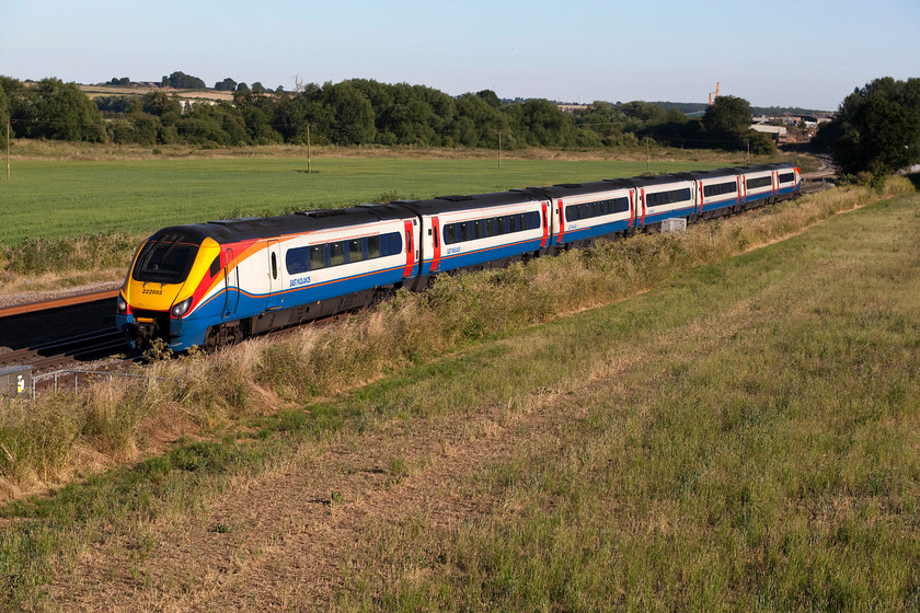 222005, EM 18.02 London St. Pancras-Sheffield (1F60, 7L), Harrowden Junction 
 222005 accelerates away from Wellingborough over Harrowden Junction with the 18.02 London St. Pancras to Sheffield (1F60) working. This was a glorious evening that was one of a string of super summer days that contributed towards June 2018 being the sunniest and one of the warmest on-record. 
 Keywords: 222005 1F60 Harrowden Junction