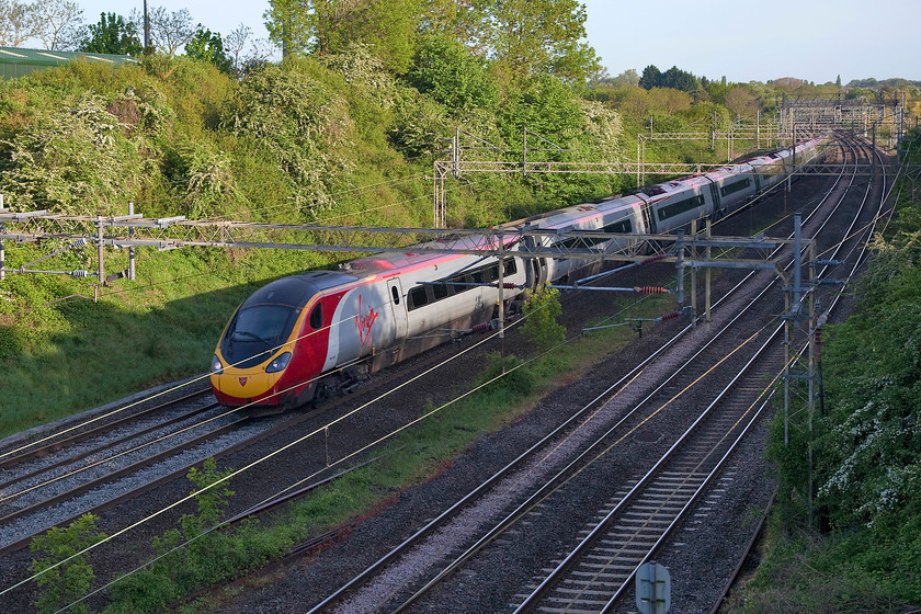 390152, VT 05.45 Wolverhampton-London Euston (1R04, 1L), Victoria Bridge 
 I left home to get to my friend Andy's house just before the Highland Sleeper was due through Roade on the WCML. So, I called in at Victoria Bridge near home. Just in front of the sleeper was 390152 'Virgin Knight' working the 05.45 from Wolverhampton to London Euston. Unfortunately, the sun was just too low in the sky to get on the nose but I love the lighting in this shot I have included the image. 
 Keywords: 390152 1R04 Victoria Bridge