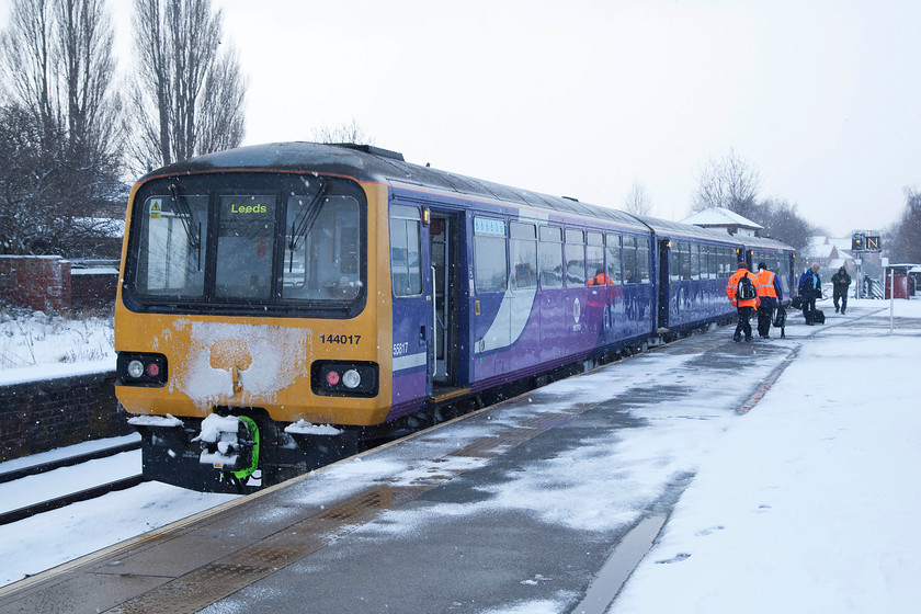 144017, NT 13.06 Sheffield-Leeds (2L34, 2L), Castleford station 
 The crew of 144017 working Northern Rail's 13.06 Sheffield to Leeds change ends at Castleford station ready to retrace their steps back to Whitwood Junction and then head north to Leeds. Again, despite the appalling conditions, this train only arrived two minutes late at its destination 
 Keywords: 144017 2L34 Castleford station