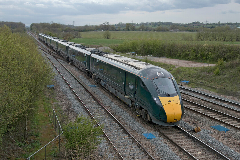 800309, GW 12.15 Penzance-London Paddington (1A88, 9L), Fairwood Junction 
 Great Western IET 800309 takes the Westbury avoider or 'cut off' as it is colloquially referred to passing Fairwood Junction. Rather than running at line speed, the 12.15 Penzance to Paddington appeared to at a reduced speed and indeed, looking at RTT revealed that it had been slowed at Castle Cary and that it then ran at what appeared to be deliberately late all the way to the capital. This was in common with all other up express services; perhaps a warning had been issued to drivers about the underframe cracking issues that led to the entire withdrawal of the fleet the following day? 
 Keywords: 800309 12.15 Penzance-London Paddington 1A88 Fairwood Junction Great Western Railway IET GWR