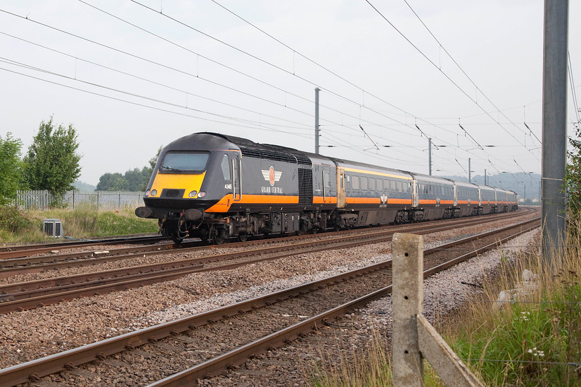 43465, GC 08.03 London King s Cross-Sunderland (1N90, RT), Shortmead House Crosing TL190460 
 43465 heads north past Shortmead foot crossing just north of Bigglesdwade. I wouldn't normally take a picture of a concrete post and a going away shot of an HST but this was one of the last pictures I might take of one of GC's buffer beam power cars as they were due to come off-lease at any time. The HST was forming the 08.03 King's Cross to Sunderland. 
 Keywords: 43465, GC 08.03 London King's Cross-Sunderland (1N90, RT), Shortmead House Crosing TL190460