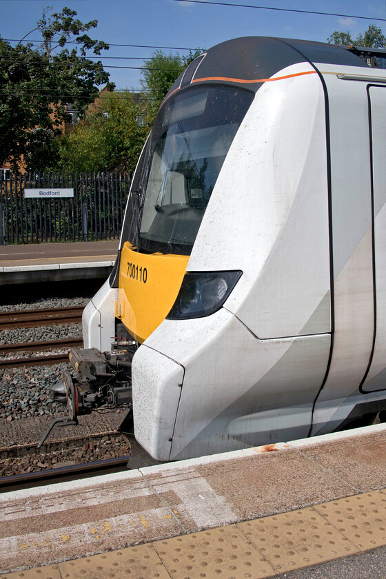 700110, TL 10.35 Bedford-Gatwick Airport (9R19, 2L), Bedford station 
 I find the front end design of the Class 700 Desiro City units rather clumsy and if I'm honest ugly! I am sure that the drivers appreciate their huge screen affording excellent visibility but as for those mock buffers that protrude from each side I really don't get it! 700110 waits to leave Bedford with the 10.35 to Gatwick Airport. 
 Keywords: 700110 10.35 Bedford-Gatwick Airport 9R19 Bedford station