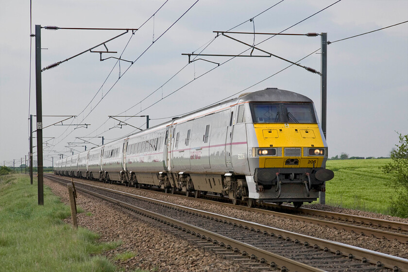 82206, GR 16.16 Leeds-London King's Cross (1A40), Frinkley Lane crossing SK906436 
 With some afternoon sun just illuminating the train, DVT 82206 leads the 16.16 Leeds to King's Cross East Coast service. Interestingly, this train left the Yorkshire capital just a few minutes after I arrived at this spot, Frinkley Lane, earlier in the afternoon! 
 Keywords: 82206 16.16 Leeds-London King's Cross 1A40 Frinkley Lane crossing SK906436 East Coast DVT