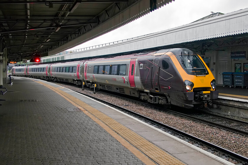 221141, 10.00 Bristol Temple Meads-Manchester Piccadilly (1M33, 23L), Bristol Temple Meads station 
 CrossCountry's 221141 waits in the pouring rain at Bristol Temple Meads. Soon it will leave working the 10.00 service to Manchester Piccadilly. Who in their right mind would want to travel all that way in what is, after all, just a four-car DMU? 
 Keywords: 221141, 10.00 Bristol Temple Meads-Manchester Piccadilly 1M33 Bristol Temple Meads station CrossCountry Voyager