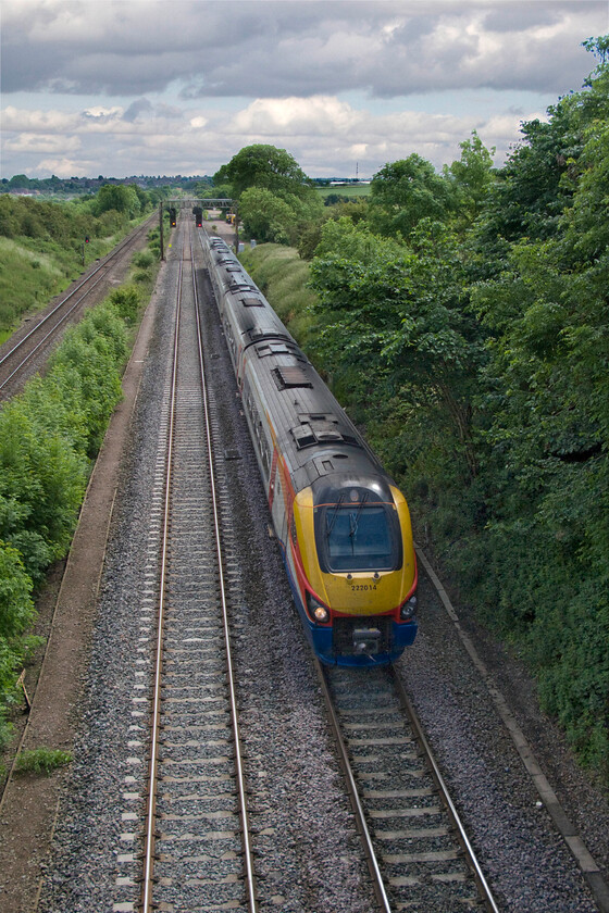 222014, EM 13.26 London St. Pancras-Sheffield (1F38), Glendon Road bridge SP855815 
 222014 accelerates away from Kettering, seen in the background, working the 13.26 St. Pancras to Sheffield service. At some time in the not too distant future, this line will be quadrupled again and when this happens I believe that it will be the longest section of continuous four-track line in the country unless anybody can advise me differently! 
 Keywords: 222014 13.26 London St. Pancras-Sheffield 1F38 Glendon Road bridge SP855815 EMT Meridian