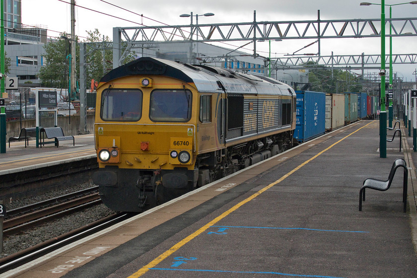 66740, 03.15 Felixstowe North-Trafford Park (4M21), Milton Keynes Central station 
 66740' Sarah' brings the regular 4M21 03.15 Felixstowe to Trafford Park Freightliner through Milton Keynes station. This 66 was named after a member of the GBRF finance team in a ceremony at Norwich station during August 2014. 
 Keywords: 66740 03.15 Felixstowe North-Trafford Park 4M21 Milton Keynes Central station