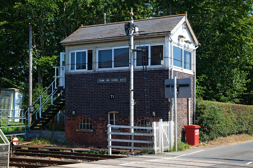 Tram Inn signal box (GWR, 1894) 
 Tram Inn signal box is a GW Type 5 structure dating from 1894. In recent years the large framed UPVC windows have somewhat spoilt the look of the box but it's good to see that it still has its cast plate. The up home signal that protects the level crossing is sighted in a odd position right in front of the box. 
 Keywords: Tram Inn signal box