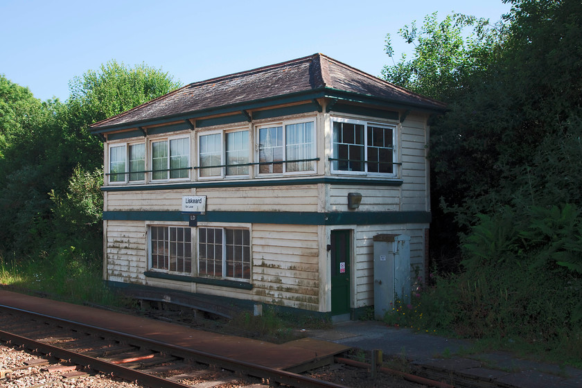 Liskeard signal box (GW, 1915) 
 Unfortunately Liskeard signal box sits in the shade making a photograph tricky, but, appropriate use of Photoshop levels has produced a presentable shot. The box is a timber constructed type 27c dating from 1915. It oversees and controls a very complicated arrangement that links the Moorswater freight and Looe passenger branches to the mainline. 
 Keywords: Liskeard signal box