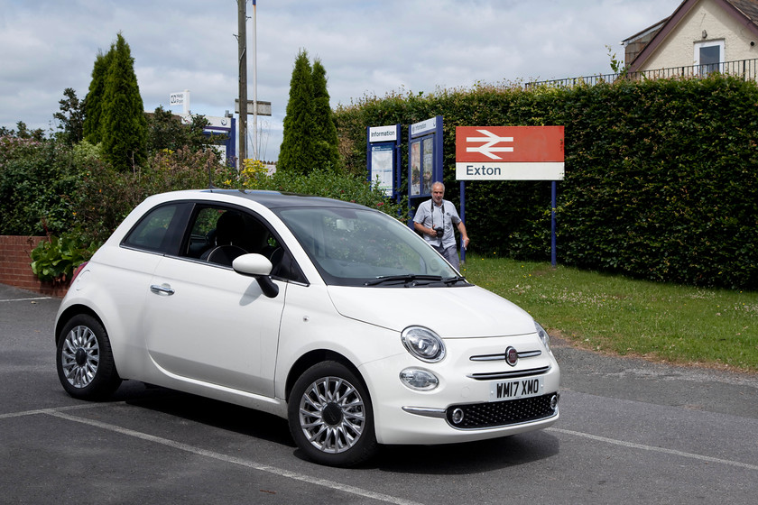 Andy, the hire car, Exton station car park 
 Andy makes his way back to the car we hired for the four-day trip at Exton station. 
 Keywords: Exton station car park