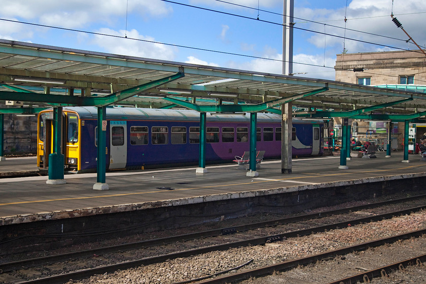 153358, NT 12.08 Carlisle-Barrow-in-Furness (2C46), Carlisle station 
 153358 waits in one of Carlisle's south facing bay platforms. The single-car unit will soon follow the stunning Cumbrian Coast line as the 12.08 to Barrow-in-Furness. 
 Keywords: 153358 12.08 Carlisle-Barrow-in-Furness 2C46 Carlisle station