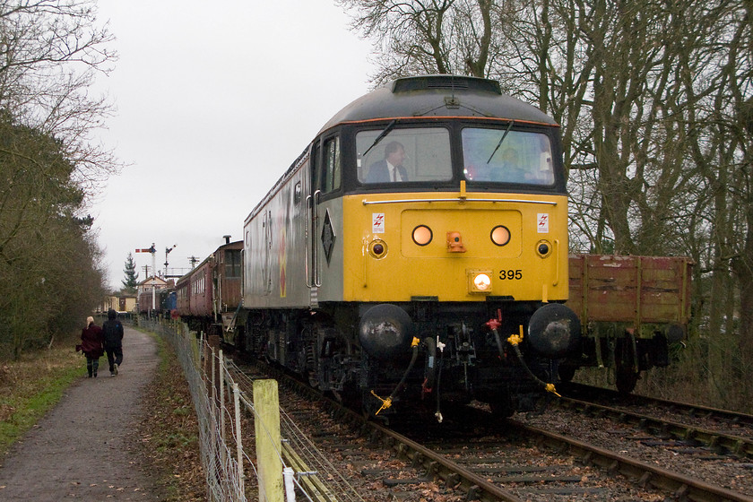 47205, 11.00 ex Pitsford & Brampton station, Pitsford sidings 
 Whilst my wife and son walk along the path next to the line, 47205 leaves Pitsford station with the 11.00 return working. Unfortunately, they were not able to offer a steam loco. for their first trains of 2015. I was able to appreciate the former Freightliner locomotive hauling the trains but I am not sure that the 'normals' visiting the line for a day out were quite so enthusiastic. 
 Keywords: 47205 11.00 Pitsford & Brampton station Pitsford sidings