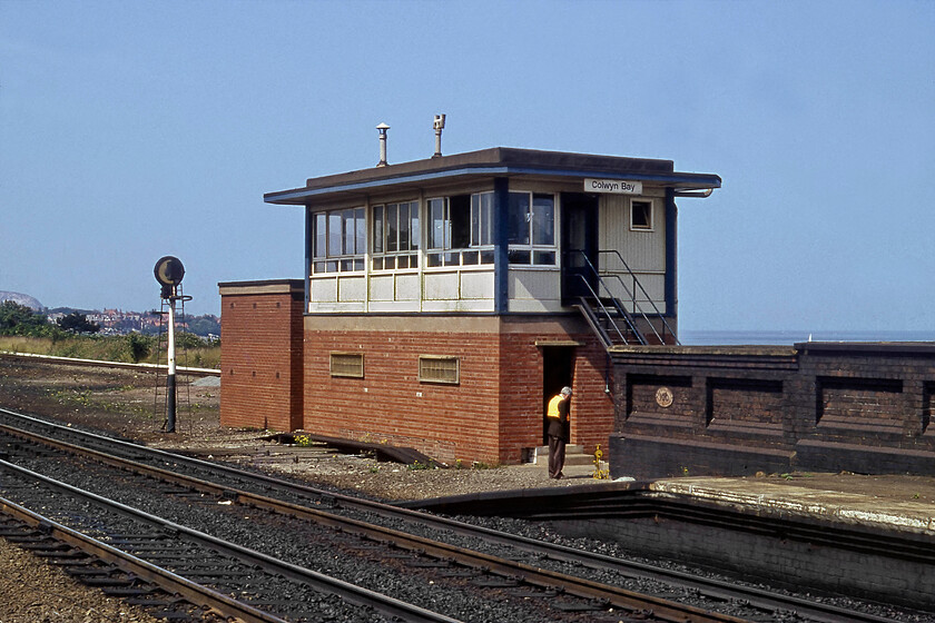 Colwyn Bay signal box (BR, 1968) 
 Prior to 1968, there were two L&NWR signal boxes at Colwyn Bay that were deemed a little excessive so BR rationalised things by closing these two and installing a standard Type 15 box as seen here. The replacement contained a thirty-five lever London Midland frame but this only lasted until 1991 (just twenty-three years) when it was closed with control moving to Llandudno Junction with the installation of some colour lights in Colwyn Bay. 
 Keywords: Colwyn Bay signal box British Railways