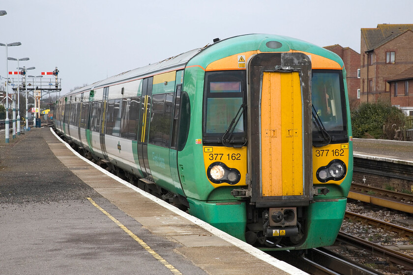 377162, SN 14.02 London Victoria-Bognor Regis, Bognor Regis station 
 Southern's 377162 arrives at Bognor Regis station with the 14.02 'fast' service from London Victoria. The rear of the train is passing a pair of Bognor's up platform starter signals. Semaphores and mechanical signalling abound at Bognor but for how long? There do not appear to be any immediate plans to abolish the signalling but I am sure that in the next few years, modernisation will render them redundant. 
 Keywords: 377162 14.02 London Victoria-Bognor Regis Bognor Regis station Southern Electrostar