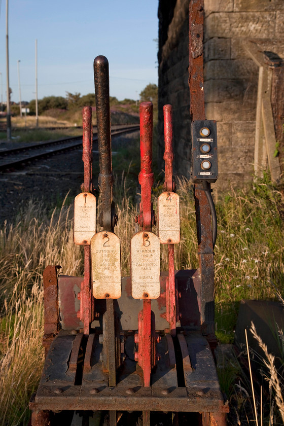 Ground frame, Ayr Harbour branch 
 A very rusted ground frame that controls the pointwork and signalling at the entrance to Ayr Harbour sidings. These levers have not been moved for some time but I am sure that with a little TLC, they could be reactivated again. 
 Keywords: Ground frame, Ayr Harbour branch