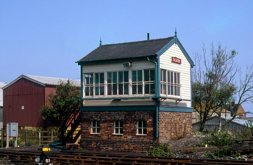 Talacre signal box (LNW, 1903) 
 The size of Talacre signal box would suggest that it was a relatively insignificant block post on the North Wales coastal route. However, the 1903 L&NWR box was a busy one complete with its twenty-four levers (later reduced to fifteen) that controlled access to a number of reception sidings and the short branches in and out of Point of Ayr colliery. The colliery (the most northerly in Wales) closed in August 1996 with the last train leaving with the coal mined prior to closure a month later. During my last visit, the box had gone but the pair of sidings into the once-busy colliery complex were still extant disappearing into a mass of trees that had taken over in the intervening years. I will upload the image and provide a link when I get to it which at the present rate of knots will be in abut ten years' time! 
 Keywords: Talacre signal box L&NWR 1903