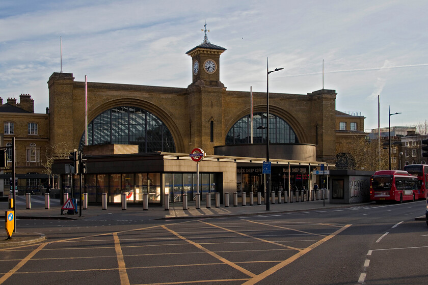 Frontage, London King's Cross station 
 I have several photographs of Lewis Cubitt's impressive King's Cross frontage but none as quiet as this one! I walked from our hotel early to see a charter and was struck when crossing Euston Road how little traffic there was and the almost complete absence of pedestrians. I suspect that one of the reasons for the latter was that the station was extremely quiet due to it being an ASLEF strike day with very few trains running on the ECML. 
 Keywords: Frontage London King's Cross station