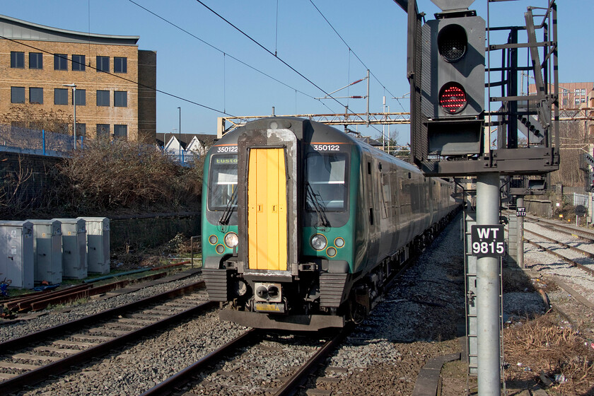 350122, LN 09.36 Birmingham New Street-London Euston, (1Y28, 1L), Watford Junction station 
 Having viewed the first prospective purchase of the day and rejected it due to it being an utter shambles and misdescribed, I headed back to Watford Junction station to continue my quest. My second train of the day arrives that I took to Euston, the 09.36 ex Birmingham New Street. On arrival in the capital I took a staright run along the Northern Line to Finchley Central. 
 Keywords: 350122 09.36 Birmingham New Street-London Euston 1Y28 Watford Junction station London Northwestern Desiro