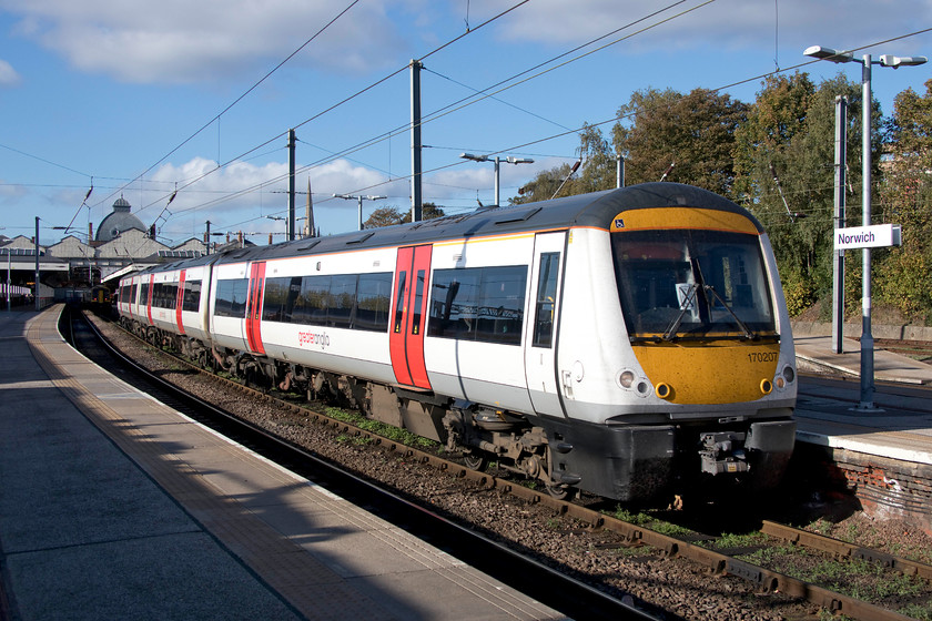 170207, GA 14.40 Norwich-Cambridge (1K81, 3L), Norwich station 
 170207 leaves Norwich station forming the 14.40 to Cambridge. This unit looks smart in its white Greater Anglia livery but I suspect that maintaining these trains in this condition takes some considerable work! 
 Keywords: 170207 GA 15.40 Norwich-Cambridge 1K83 Norwich station