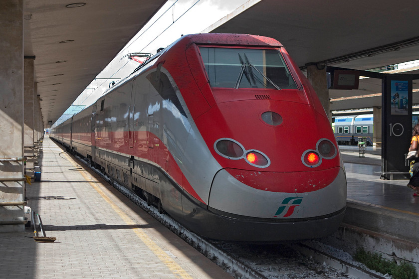 500.018, 14.20 Milan Central-Naples Central (9537), Florence SMN station 
 Trenitalia 500.018 waits at Florence SNM station to leave with the 9537 14.20 Milan Central to Naples Central express. These ETR express' are fast and elegant trains that hold a number of speed records including one of 362 km/h (225 mph) set between Florence and Bologna in 2009. 
 Keywords: 500.018 14.20 Milan Central-Naples Central 9537 Florence SMN station