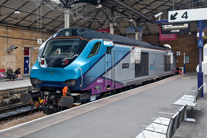 68032, stabled, Scarborough station 
 In preparation for the introduction of locomotive hauled services with the newly built Mk. V stock TransPennine Express have been stabling class 68s at various strategic locations along the route the trains will operate on. 68032 'Destroyer' sits at Scarborough station. The class 68s are owned by Beacon Rail which leases fourteen of the class (68019-68032) to TransPennine Express. I still struggle with them not having any yellow hi-viz paint on their front ends, something I will have to get used to as more locos. and units appear looking like this. 
 Keywords: 68032 Scarborough station