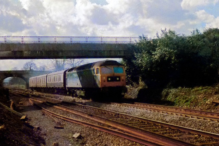 Class 47, up parcels working, Bathampton Junction 
 A Class 47 makes light work of a three-carriage up parcel working. It is speeding past Bathampton Junction heading eastwards. Again, no prizes for this photograph but my skills were very much in their early stages at this time in my life! 
 Keywords: Class 47 parcels train Bathampton junction bath