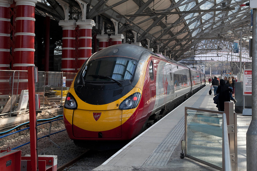 390118, VT 11.47 Liverpool Lime Street-London Euston (1A30, RT), Liverpool Lime Street station 
 With further evidence of the rebuilding of Lime Street station in the background, 390118 'Virgin Princess' leaves Lime Street working the 11.47 to London Euston. I have always found Lime Street a light and airy station in which to take photographs with a large range of train types to keep a spotter interested. 
 Keywords: 390118 1A30 Liverpool Lime Street station