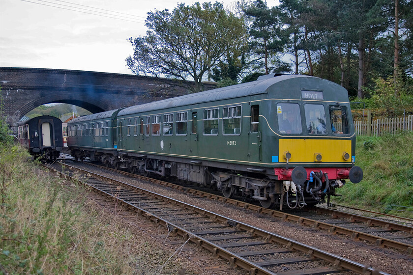 M51192 & M56352, 11.15 Sheringham-Holt, Weybourne station 
 M51192 leads M56352 away from Weybourne station working the 11.15 Sheringham to Holt train. First-generation DMUs are the mainstay of many heritage lines being relatively cheap, convenient and easy to operate whilst at the same time being sufficiently, for want of a better word, 'quaint' in the eyes of the visiting public. It's also interesting to note that in some cases they are actually older than the steam trains in operation on a particular day. For example, as is the case when the NNR is operating the 9F 92220 'Black Prince'. 
 Keywords: M51192 M56352 11.15 Sheringham-Holt Weybourne station Class 101 DMU