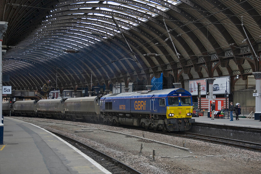 66750, 06.23 Tyne Coal Terminal-Drax power station, York station 
 Having been only operating on the UK network for less than a year, previously in use on German Railways, 66750 brings the 06.23 Tyne Coal Yard to Drax power station through York station. Interestingly, this particular Class 66 has almost rectangular buffers rather than the more oval-shaped ones fitted to the rest of the class, I wonder if this is due to its previous operating life? 
 Keywords: 66750 06.23 Tyne Coal Terminal-Drax power station York station GBRf GB Railfreight