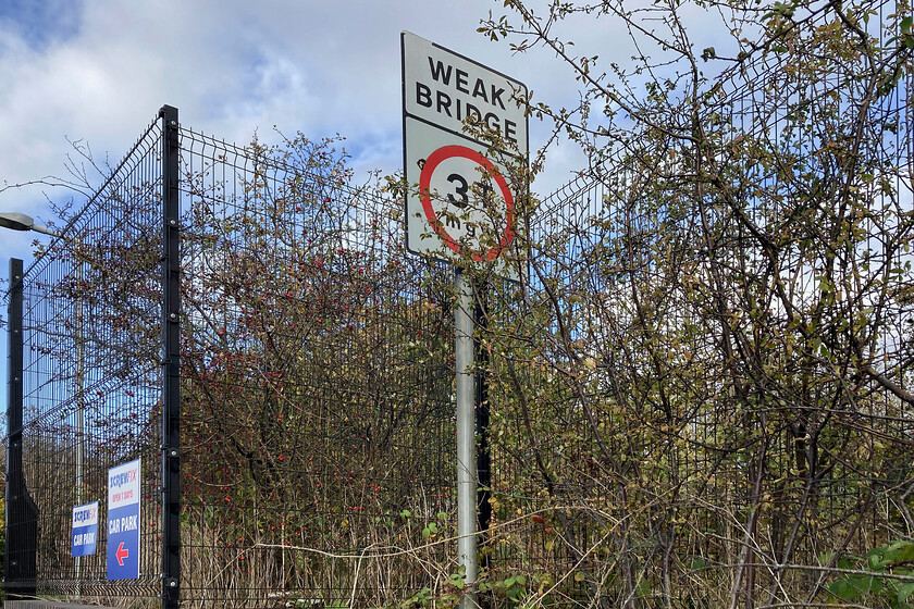 Sign, SMJR bridge 149, Towcester 
 An odd sign and somewhat superfluous as the road no longer carries anything heavier than a cyclist and pedestrian or two; this especially as the sign actually looks to be fairly new! The sign is protecting a former overbridge that carried the former Tiffield Road over the SMJR line just to the east of Towcester station. 
 Keywords: Sign SMJR bridge 149 Towcester