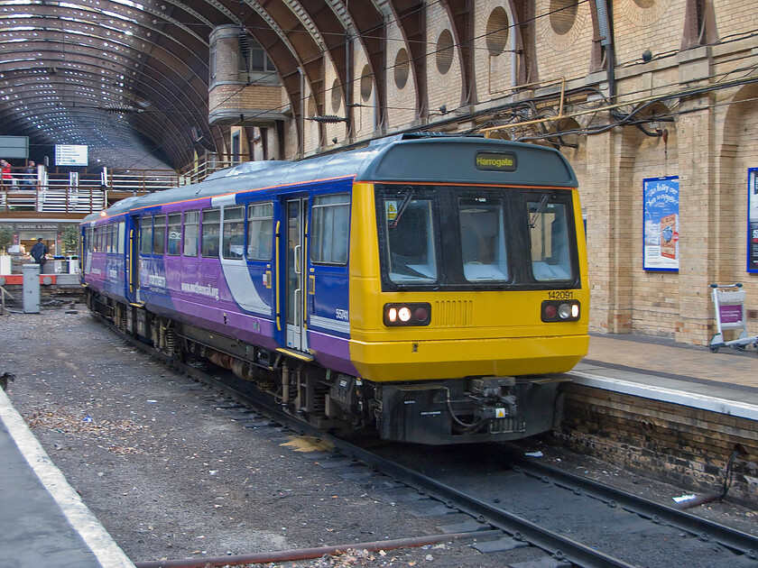 142091, NT 09.11York-Leeds (2C17), York station 
 142091 is preparing to leave York station working the 09.11 York to Leeds Northern service. We could have caught this train to Harrogate but my wife and son were not up and ready in time thus leaving me to kill an hour or so at the station whilst waiting for them! 
 Keywords: 142091 09.11York-Leeds 2C17 York station Northern Pacer