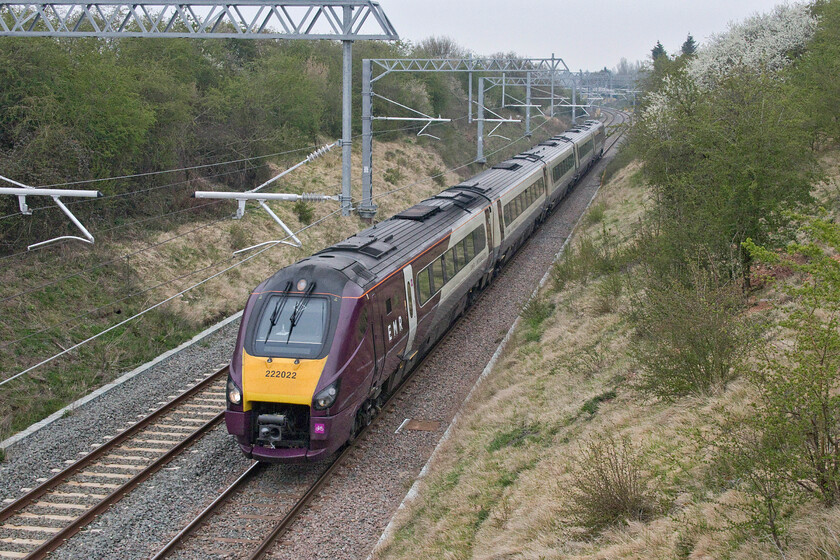 222022, EM 07.30 Derby-London St. Pancras (1C98, 2E), Wymington SP955638 
 Making extremely sedate progress along the up slow line at Wymington (Bedfordshire) 222022 'Invest In Nottingham' works the 07.30 Derby to St. Pancras service. I am not sure what precipitated this train being moved to the slow line at Harrowden Junction as RTT showed that it should have been stopping at Wellingborough's platform two with platform four shown in red (meaning a platform alteration). Either way, this is my first photograph of a passenger train on the up slow at this location. 
 Keywords: 222022 07.30 Derby-London St. Pancras 1C98 Wymington SP955638 Invest In Nottingham EMR East Midlands Railway