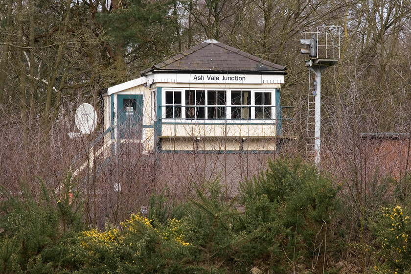 Ash Vale Junction signal box (LSW, 1879) 
 It took me some time to reach a position from where I could capture an image of Ash Vale Junction signal box deep some woodland adjacent to a vast area of army firing ranges. Indeed, Andy who stayed in the car whilst I went off exploring was concerned on hearing gunshots wondering if I had got myself into trouble! The box dates from 1879 and is a non-standard L&SWR design that now contains a Network Rail updated switch panel. The box still wears its British Rail corporate identity printed design nameplate.

NB The box was to close, along with two others at Aldershot and Farnham, on 24.08.13 just four months after this photograph was taken (Note added 04.24) 
 Keywords: Ash Vale Junction signal box LSW. London and South Western Railway